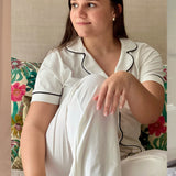 Women's white cotton pajamas with black trim